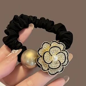Elegant Black and Gold Camellia Scrunchie